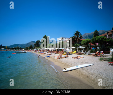 Beach scene at the picturesque resort of Nidri on the Greek island of Lefkas Stock Photo