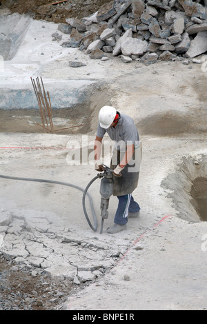 A construction worker with a jackhammer, Berlin, Germany Stock Photo