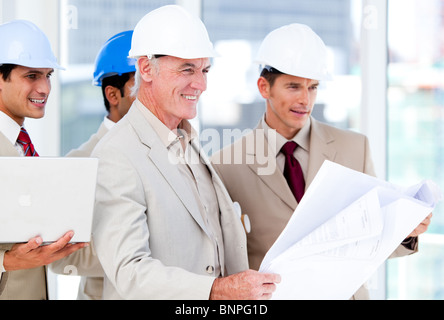 Architect team working on a building project Stock Photo