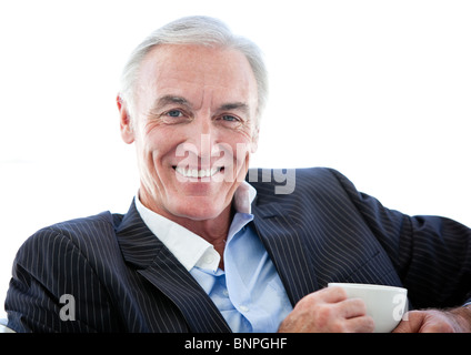Confident senior businessman drinking a coffee Stock Photo