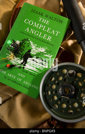 Fly Fishing rod reel bag flies Izaak Walton book The Compleat Angler Stock Photo