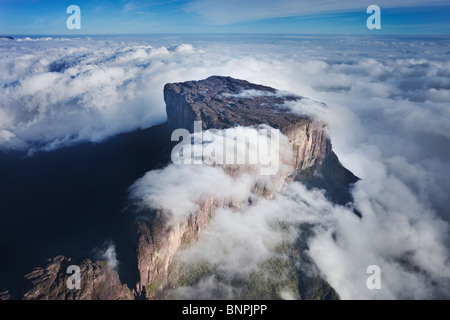 Aerial view Mount Roraima is the highest tepui reaching 2810 meters in elevation. Cloud covered flat top mountains. Venezuela Stock Photo