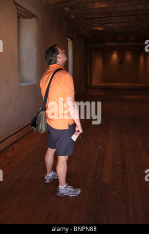 Tourist visiting Iglesias de San Ysidro, patron saint of farmers, in Corrales, New Mexico, June 10, 2010 Stock Photo