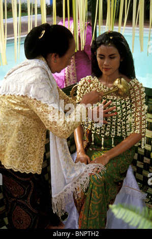 A Javanese bride prepares for her ritual washing ceremony Stock Photo