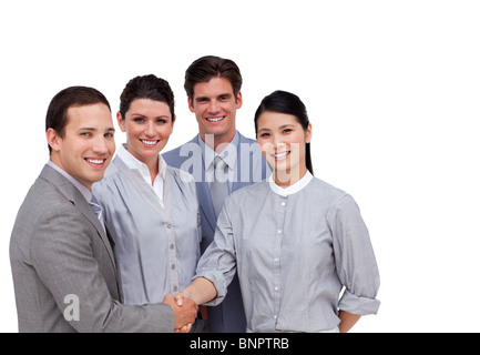 Delighted international business team working together Stock Photo