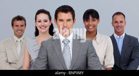 Positive business team in front of the camera Stock Photo