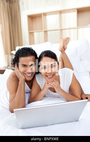 Young couple using a laptop Stock Photo