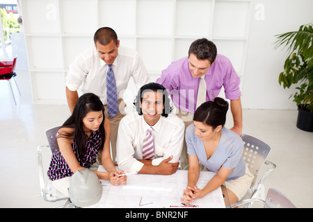 A diverse group of engineers smiling at the camera Stock Photo