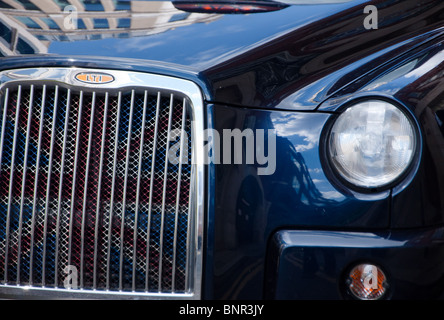 Blacl taxi cab closeup with Union flag in the grill. London. England. Stock Photo