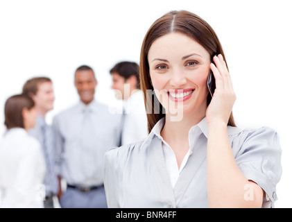 Smiling businesswoman using a mobile phone Stock Photo