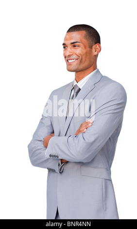 Confident businessman standing with folded arms Stock Photo