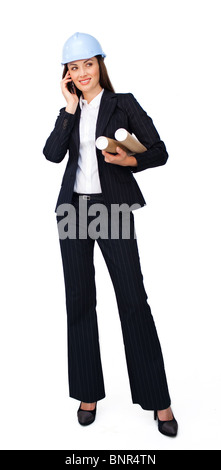 Smiling young architect on phone Stock Photo