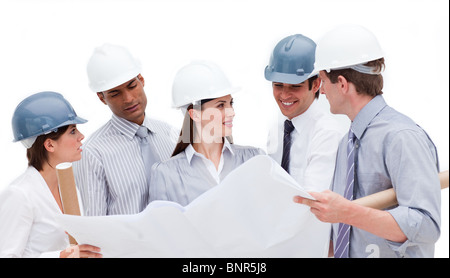Architects studying a blueprint Stock Photo