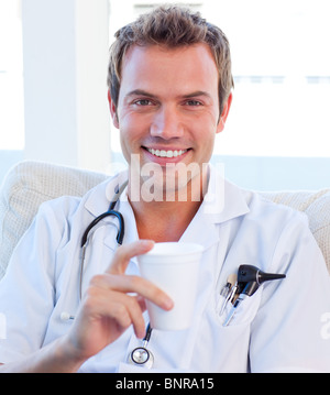 Positive doctor having a break Stock Photo