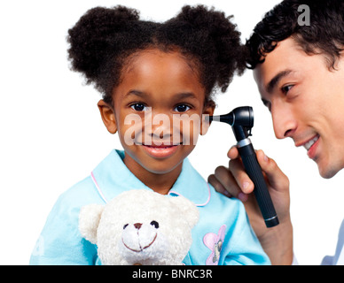 Confident doctor examining his young patient against a white background Stock Photo