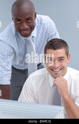 Businessmen working with a computer Stock Photo