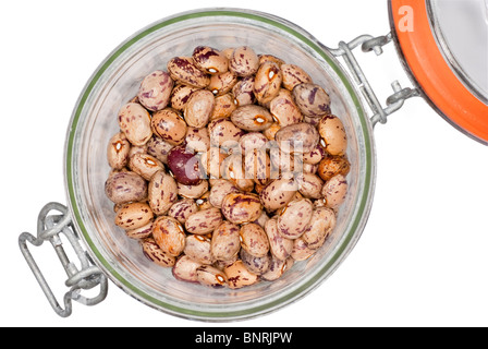 Dried Borlotti beans in a glass preserving jar. Stock Photo