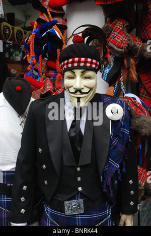 Vendetta mask on a mannequin outside a tourist shop on Edinburgh's Royal Mile. Stock Photo