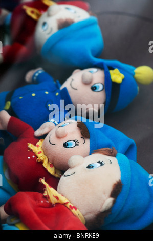 Noddy and Mr Plod soft toys in the back of a car Stock Photo