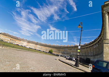 Horizontal wide angle view of the residential Georgian Royal Crescent in Bath on a beautiful sunny day. Stock Photo