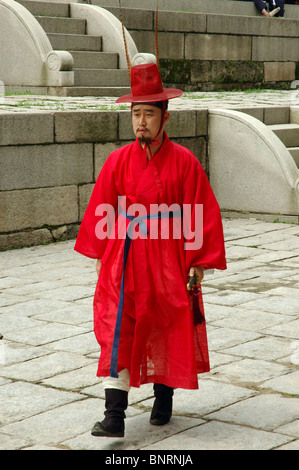 Man in a Traditional Costume at Gyeonghuigung Palace in Seoul, South Korea Stock Photo