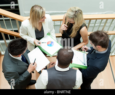 Business team having working on stairs Stock Photo