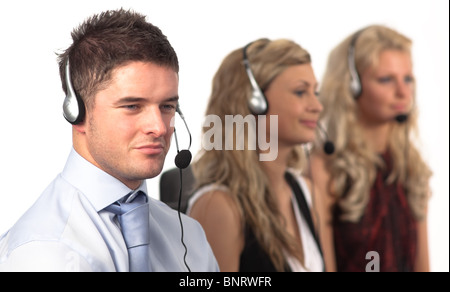 Three people in a call centre Stock Photo
