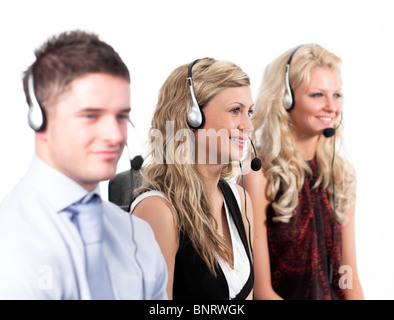 Three people in a call centre Stock Photo
