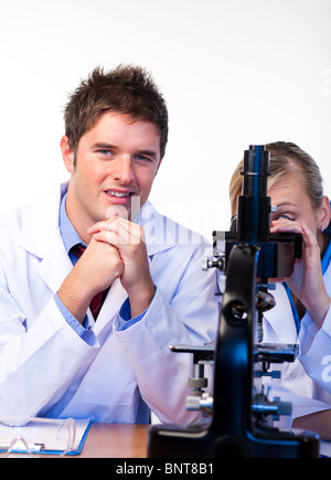 Scientists working together in a laboratory Stock Photo