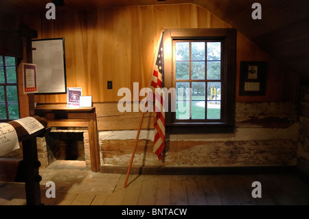 Displays inside the Atkinson-Griffin Log House at U.S. Army Corps of Engineers visitor center at the dam on Green River Lake KY. Stock Photo