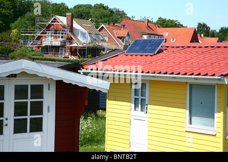 PV panels on small wooden house used for weekend and holiday in Denmark, 2009 Stock Photo