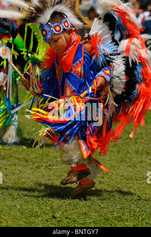 Young Native Indian Fancy Dancer in tiny tots competition at a Grand River Ontario Canada Pow Wow at Six Nations Reserve Stock Photo