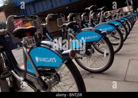 Rows of parked bicycles belonging to the Barclays cycle hire scheme Stock Photo