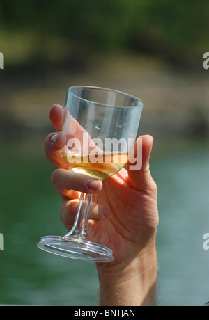 Relaxing with a glass of wine on a houseboat, Lake Cumberland, KY. Stock Photo