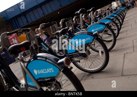 Rows of parked bicycles belonging to the Barclays cycle hire scheme Stock Photo