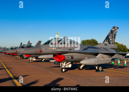 A row of McDonald Douglas F-16AM Fighting Falcon military jet aircraft on static display Stock Photo