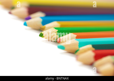 A line of colored pencils - close-up, isolated Stock Photo