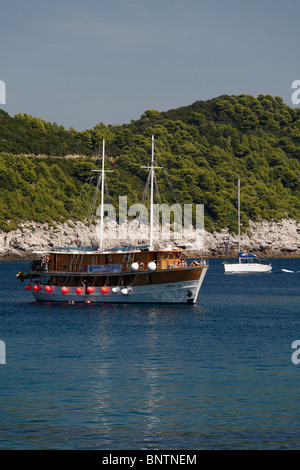 Gulet holiday charter boat in Sunj bay with the best beach on Lopud one of the Elaphite elafiti islands near Dubrovnik Croatia Stock Photo