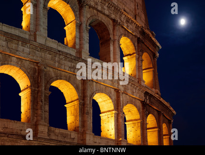 The Colosseum, or Roman Coliseum, in Rome, Italy is lit up at night Stock Photo