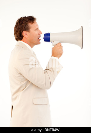 Senior businessman speaking through a megaphone Stock Photo