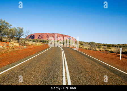 Driving to Uluru (Ayers Rock). Uluru-Kata Tjuta National Park, Northern Territory, AUSTRALIA. Stock Photo