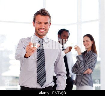 Handsome businessman celebrating a success Stock Photo