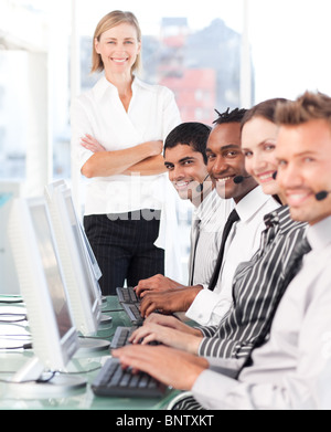 Serious team in a call center Stock Photo