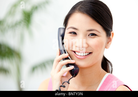 Portrait of a cheerful businesswoman talking on phone Stock Photo