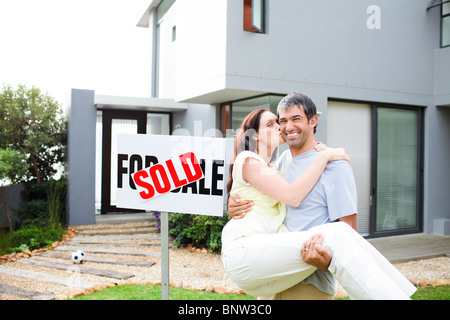 Couple celebrating their new house Stock Photo