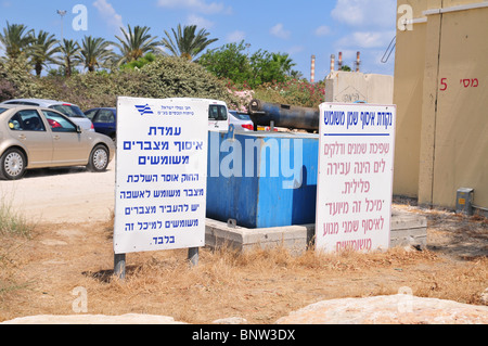 Israel, Haifa Bay, The Kishon Harbour, used by fishermen and yacht owners, Used battery collection point Stock Photo