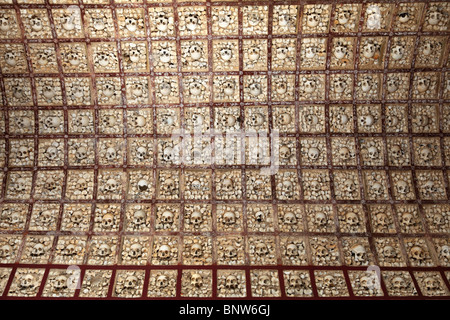 Wall of human bones in the Igreja do Carmo chapel, Faro, Portugal Stock Photo
