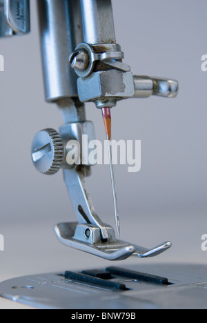 close up mechanism of sewing machine foot with needle and thread Stock ...