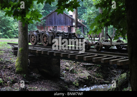 Rails and motor cars used to mine coal at Barthell coal Mining Camp, Kentucky Stock Photo