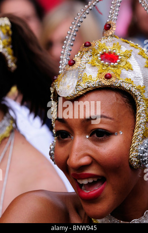 Party, dancing and portrait of samba dancer at carnival, festival and